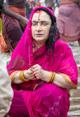 devotees sacred mantra meditation after sacred bath at triveni sangam at mahakumbh