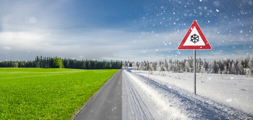 Wechsel von Winterfahrbahn zu sommerfahrbahn auf einer Landstrasse