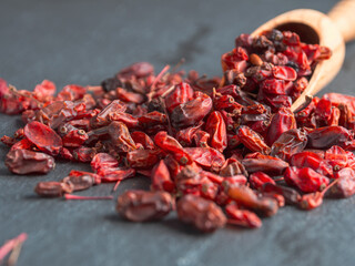 Bright barberries in the background, creating an atmosphere of freshness and natural beauty.