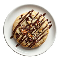 Delicious cookie topped with cho te drizzle and nuts, served on white plate. Perfect for dessert lovers