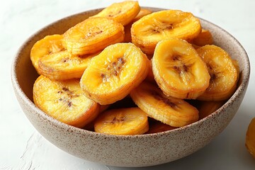 A bowl of sweet and delicious fried plantains on a table