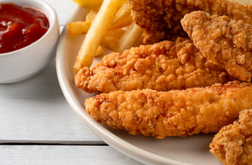 Chicken tenders. Fried chicken breast strips 