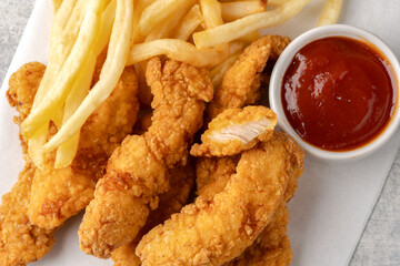 Chicken tenders. Fried chicken breast strips 