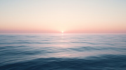 Fototapeta premium The serene ocean horizon is kissed by the soft glow of a pastel sunrise, painting tranquil reflections across gentle, undulating waves.