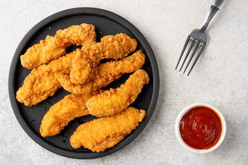 Chicken tenders. Fried chicken breast strips 