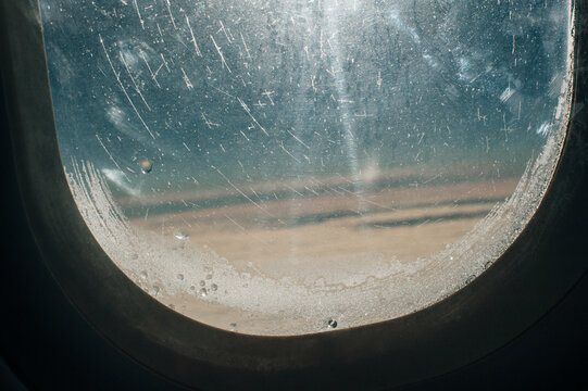 Ice crystals, snowflakes on airplane window
