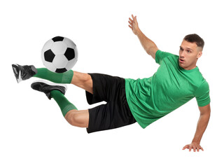 Fototapeta premium Football player in sportswear kicking soccer ball on white background