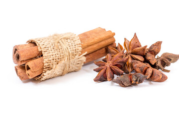 Star anise and cinnamon on white background, aromatic spices for cooking and baking