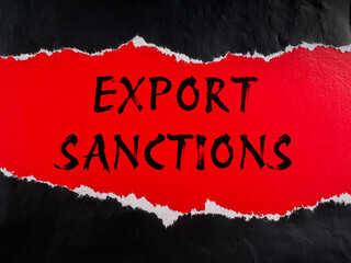 Export sanctions text title on colored black red paper background