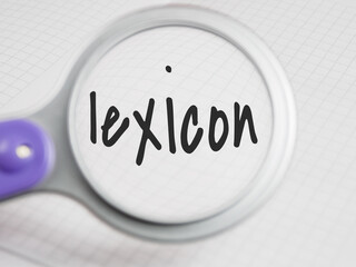 Lexicon title text through a magnifying glass on a notepad background