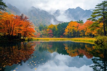 Fototapeta premium Autumn Landscape at Taisho Pond in Kamikochi, Nagano Prefecture, Japan
