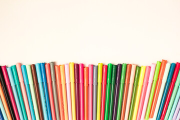 colored pencils on white background