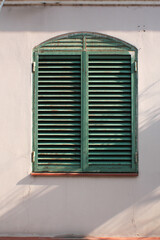 old window with shutters