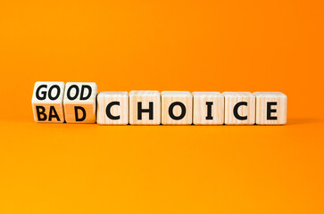 Good or bad choice symbol. Concept words Good choice or Bad choice on beautiful wooden blocks. Beautiful orange table orange background. Business good or bad choice concept. Copy space.