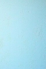 Obraz premium Light Blue Textured Wall Surface Background Image for Design Projects