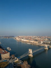 Fototapeta premium Chain Bridge and Hungarian Parliament Building connecting Buda and Pest across Danube river Bu