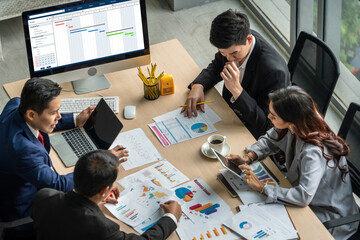 Project planning software for modish business project management on the computer screen showing timeline chart of the team project