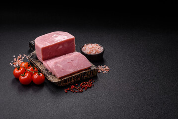 Delicious canned pink ham with salt, spices and herbs