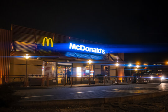 Warsaw, Poland. April 2 2024.
McDonald's restaurant at night. Fast food franchise. Big Mac Headquater.