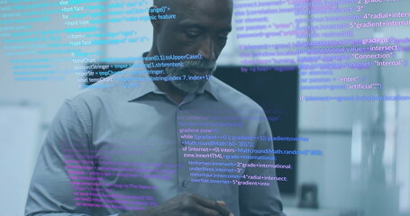 Image of data processing over biracial businessman using tablet