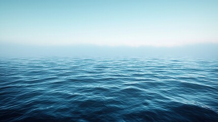 Fototapeta premium Tranquil ocean waves under a clear sky stretching to the horizon during the calm early morning hours