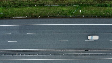 Video filming from a bird's eye view of car traffic on a section of the road. Top view, video shooting from a quadrocopter