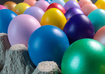 colorful eggs in egg cartons for Easter
