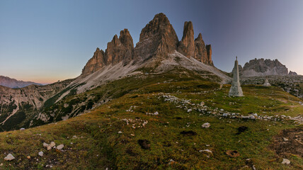 Tre Cime di Lavaredo during sunrise with warm golden light