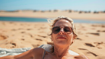 summer holidays, middle aged woman on beach