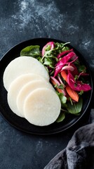 Vibrant Radish and Jicama Salad on Black Plate