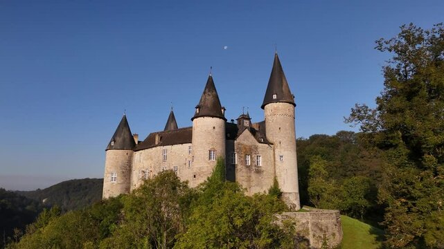 Discover the enchantment of Veves Castle amidst a clear blue sky