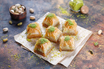 Turkish-style pistachio baklava with a glass of milk.