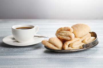 Homemade nut shaped russian soviet cookies and wafer rolls with pastry cream.