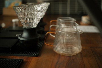 coffee dripper with glass material for brewing v60 coffee. manual brew tool