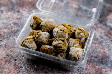 Dolma - stuffed grape leaves with rice and meat.