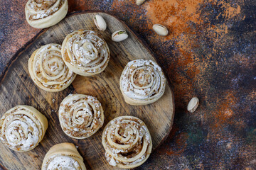 Delicious homemade meringue roll round cookies with nuts.