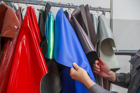 Assortment of leather goods in various colors.