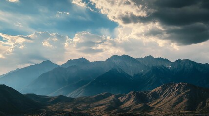 Majestic Mountain Range Under a Dramatic Sky