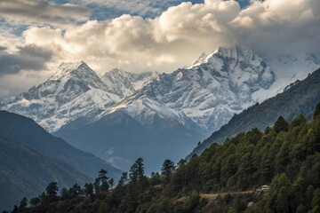 Fototapeta premium A stunning and majestic snowy mountain range with a beautiful river flowing in the foreground