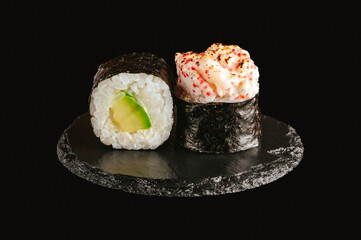 traditional Japanese sushi on a black background
