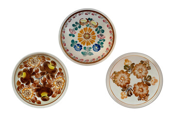Painted ceramic plate isolated on white background. set