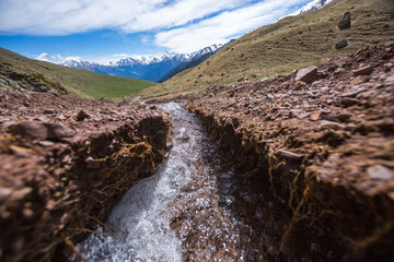 stream in Caucasus Mountains. Karachay-Cherkessia, Russia