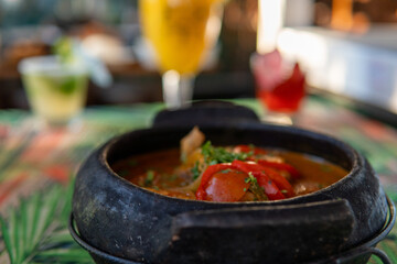 Moqueca - a culinary dish of fish stew with peppers in the Bahian style