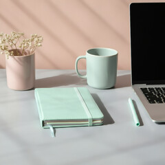 Minimalist workspace with notebook laptop pastel pink desk home office productivity creative workspace inspiration
