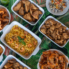 Seafood buffet with many choices of dishes in vibrant colors