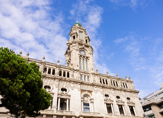 Naklejka premium Clock tower in the city hall of Porto. City center of Porto in Portugal