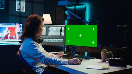 Woman using professional software on mockup PC to create visual effects for video projects....
