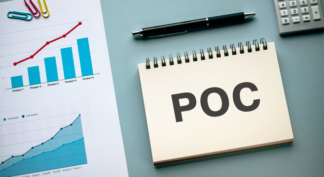 There is notebook with the word POC. It is an abbreviation for Proof of Concept as eye-catching image.