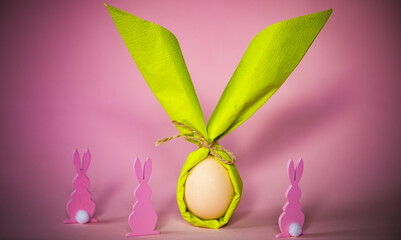 egg wrapped in easter bunny shaped napkin