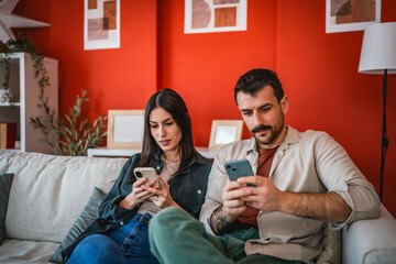 couple enjoy and use a mobile phone for entertainment and conversation
